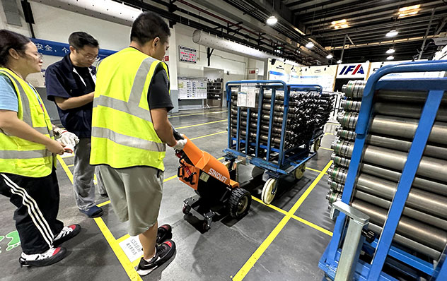 IFA powertrain warehouse center successfully receives Sinolift new mini walkie electric tow tugger to enhance efficiency